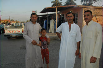 The man in the center is the person who is the nephew of my friend Mohammad.  I met this man 11-years ago when I first visited Dholoyia. His name is Qasi.