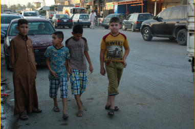Four boys on streets of Dholoyia