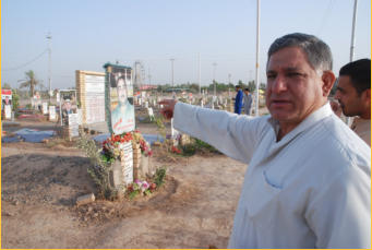 General Abdullah at the cemetery where the warriors were buried.  Most were buried in gardens at home and later transferred to the cemetery after the battle ended in January 2015