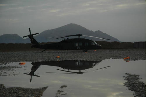 Blackhawk medevac from NM Guard seen in nice reflection in the morning light