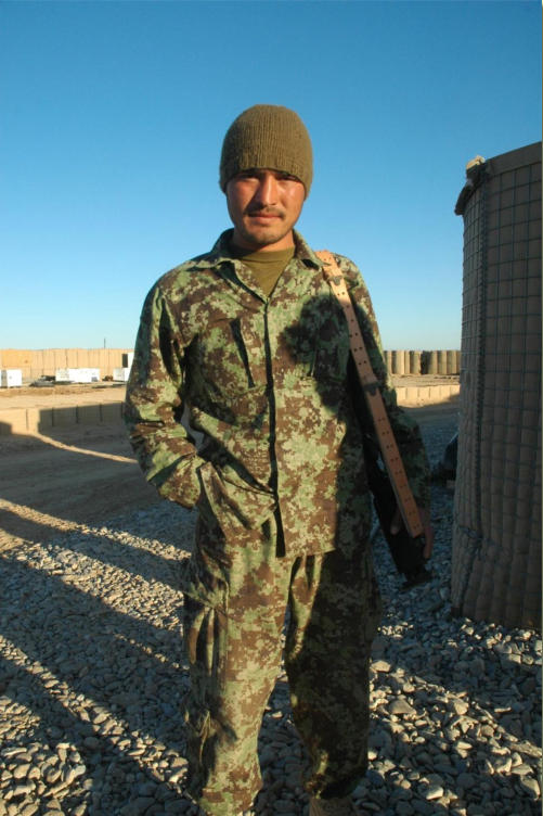 Afghan National Army troop poses for photo.