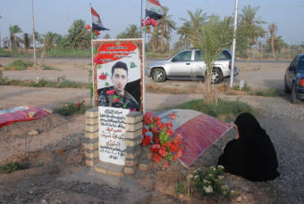 Mother grieves at son's grave