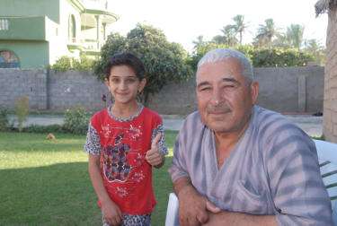 This is a hero in Dholoyia.  I call him, "the old man that throws grenades".  I have seen video of his actions.  Along side him is one of his grandaughters.  