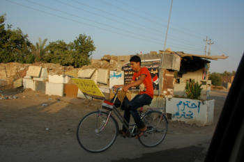 Photo retrieved.  Bicycle going through check point.