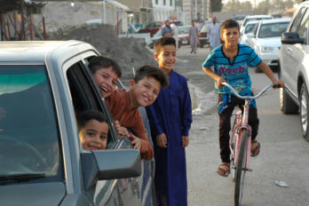Photo retrieved.  Kids downtown Dholoyia