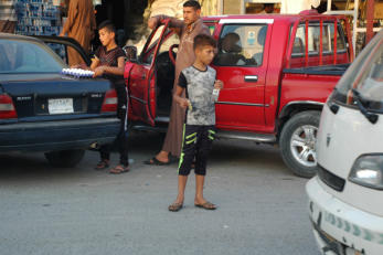 Retrieved photo.  Buying eggs and loading them up.